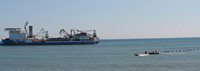 ¿Por qué se emplea corriente continua en sistemas submarinos de larga longitud?